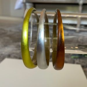 Three Alexis bittar bangles